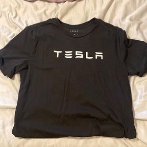 Never worn mens Tesla shirt. From smoke free home